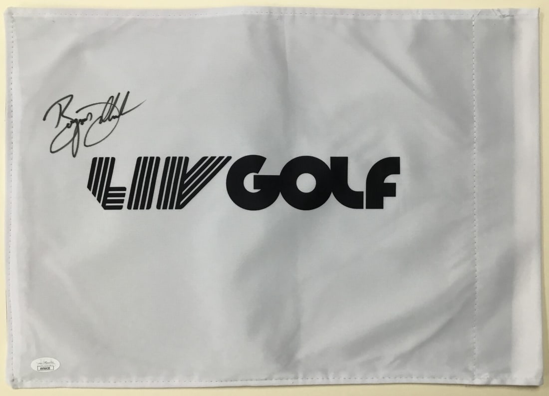 Bryson DeChambeau LIV 18 Signed Flag JSA Authenticated AV66430: Bryson DeChambeau LIV 18 Signed Flag JSA Authenticated AV66430 This is an official LIV 18 pin flag signed by PGA star Bryson DeChambeau. The autograph has been authenticated by James Spence Authentica