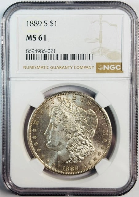 San Francisco Mint 1889 Silver Dollar NGC MS61 Graded Uncirculated: San Francisco Mint 1889 Silver Dollar NGC MS61 Graded Uncirculated This is an 1889 Morgan Silver Dollar struck at the San Francisco Mint. Certified by NGC with a grade of MS 61, this uncirculated coin