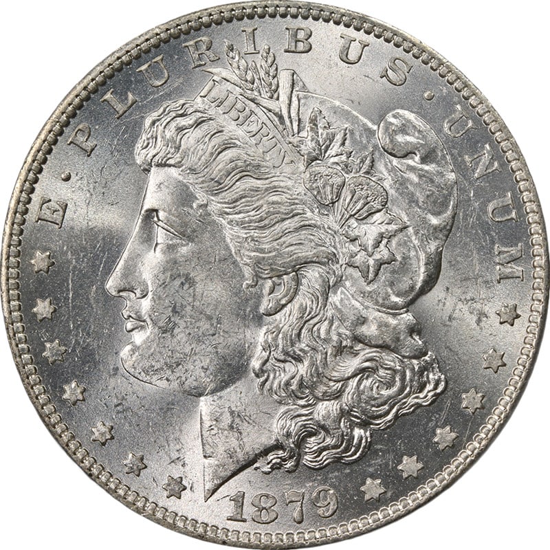 PCGS MS62 1879 O Morgan silver dollar bright white: PCGS MS62 1879 O Morgan silver dollar bright white This original 1879-O Morgan Silver Dollar is graded MS62 by PCGS. The coin features a bright white appearance with fantastic luster and a well-define