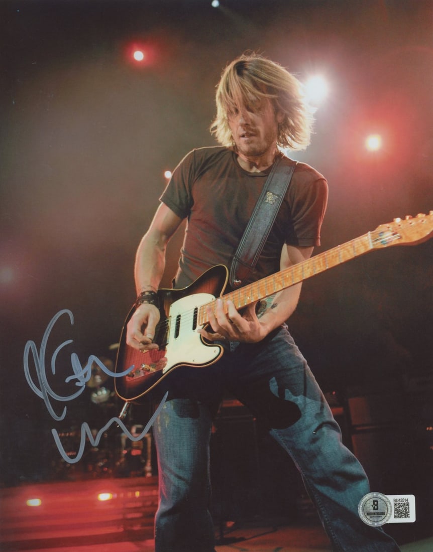 Keith Urban Signed 8x10 Photo Beckett Authenticated BAS #BU43514: Keith Urban Signed 8x10 Photo Beckett Authenticated BAS #BU43514 This authentic vertical 8x10 photograph features the signature of country music star Keith Urban. The photograph is certified by Becket