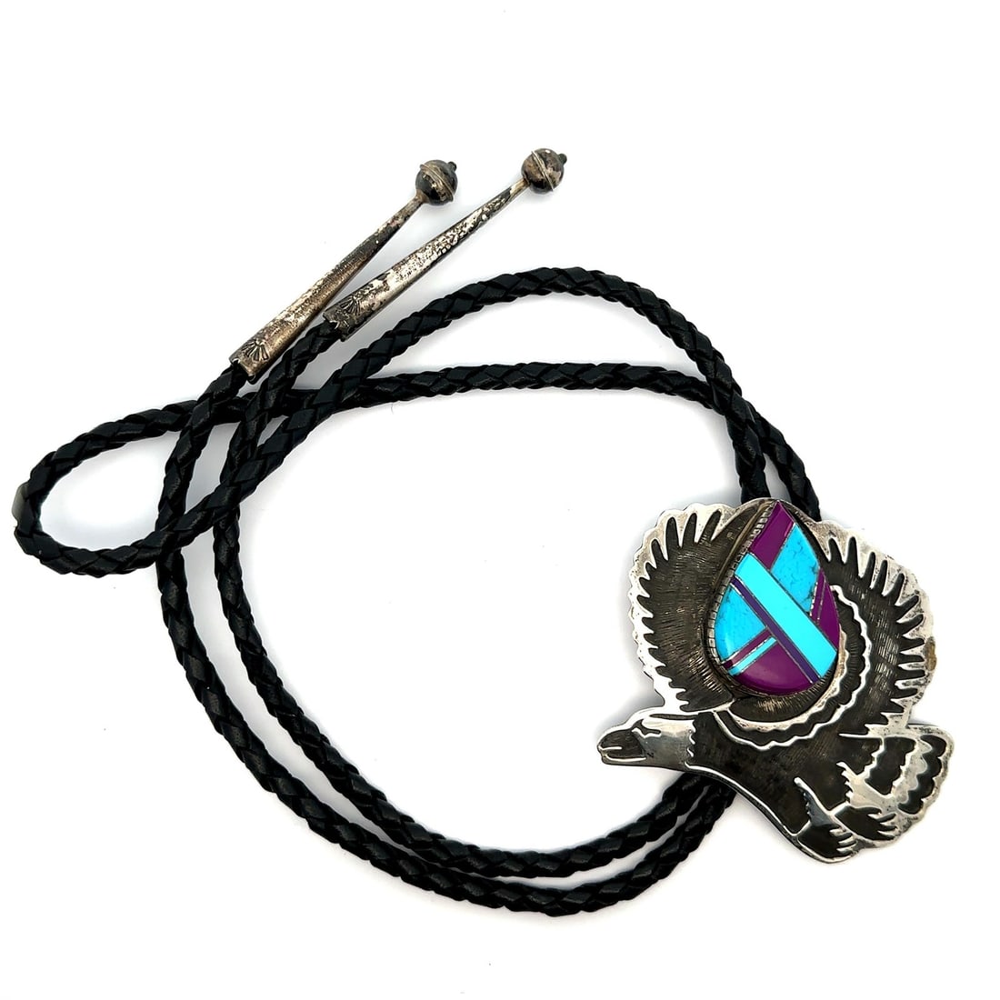 Evelyne & Edwards James Sterling Silver Eagle Bolo Tie with Turquoise & Phosphosiderite: Evelyne & Edwards James Sterling Silver Eagle Bolo Tie with Turquoise & Phosphosiderite This stunning Evelyne & Edwards James bolo tie features a beautifully crafted eagle pendant adorned with natural