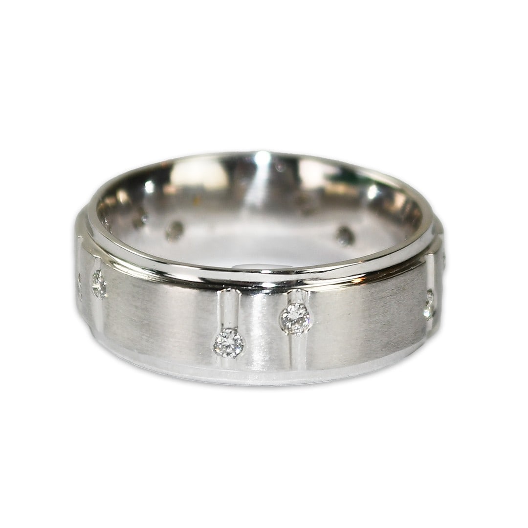 Men's 14k White Gold Wedding Ring with 0.25ct Round Diamonds: Men's 14k White Gold Wedding Ring with 0.25ct Round Diamonds This men's wedding band features 14k white gold with a brushed center and polished edges. The band is adorned with round brilliant cut natu