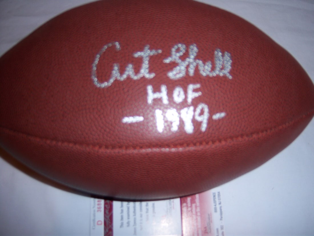 Signed Art Shell NFL Football with Hall of Fame Inscription and JSA COA: Signed Art Shell NFL Football with Hall of Fame Inscription and JSA COA This pre-owned NFL football features the authentic signature of Art Shell, a Hall of Fame player for the Raiders. The item is an
