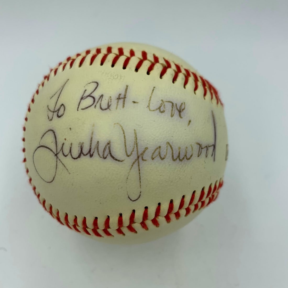 Garth Brooks Trisha Yearwood Signed Baseball with JSA COA: Garth Brooks Trisha Yearwood Signed Baseball with JSA COA This is an original autographed baseball signed by country music stars Garth Brooks and Trisha Yearwood. Featuring their signatures, this base