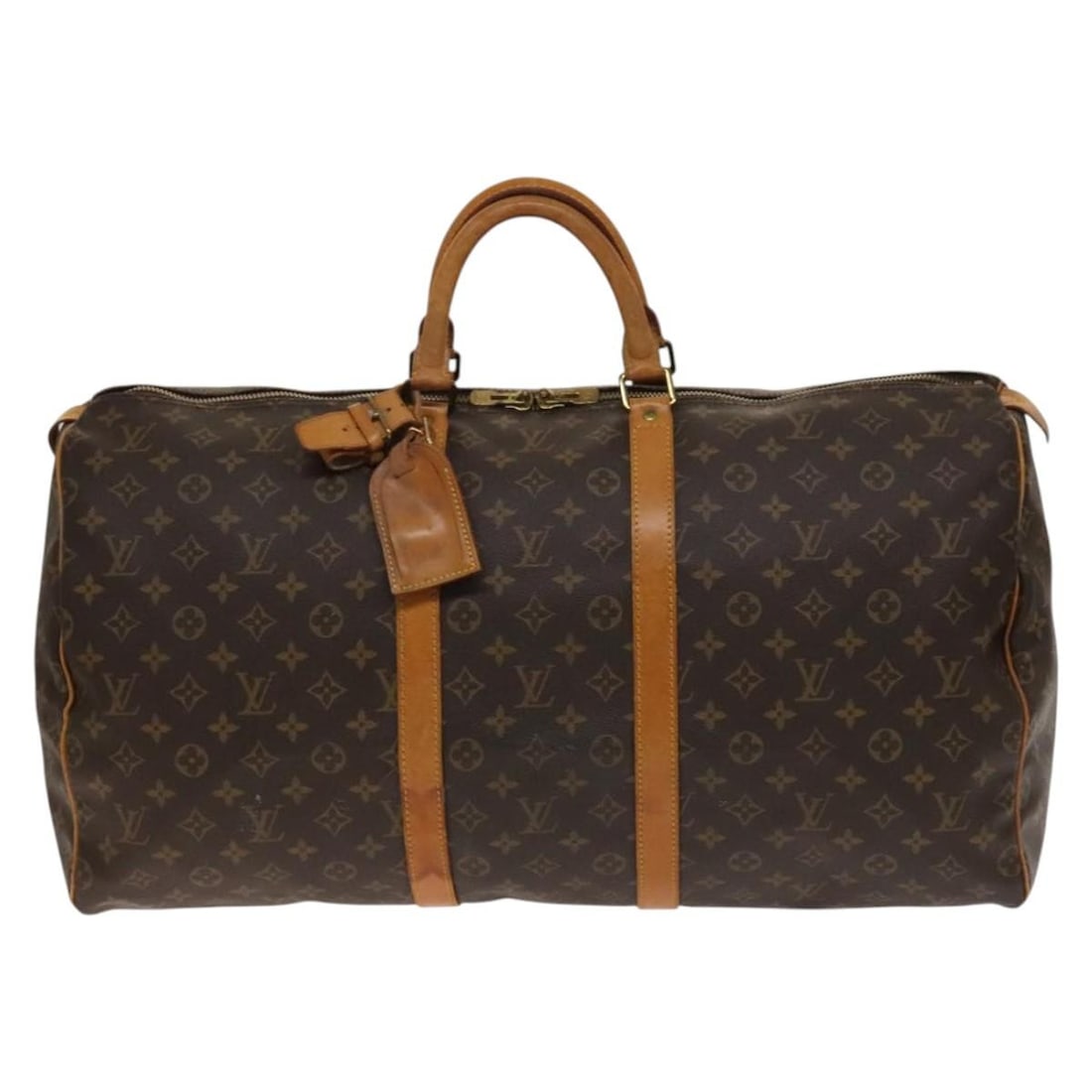 Keepall Monogram Canvas Travel Bag by Louis Vuitton Unisex 55cm: Keepall Monogram Canvas Travel Bag by Louis Vuitton Unisex 55cm This Louis Vuitton Keepall bag features the iconic Monogram canvas in brown and is designed for unisex use. The bag shows signs of use, 