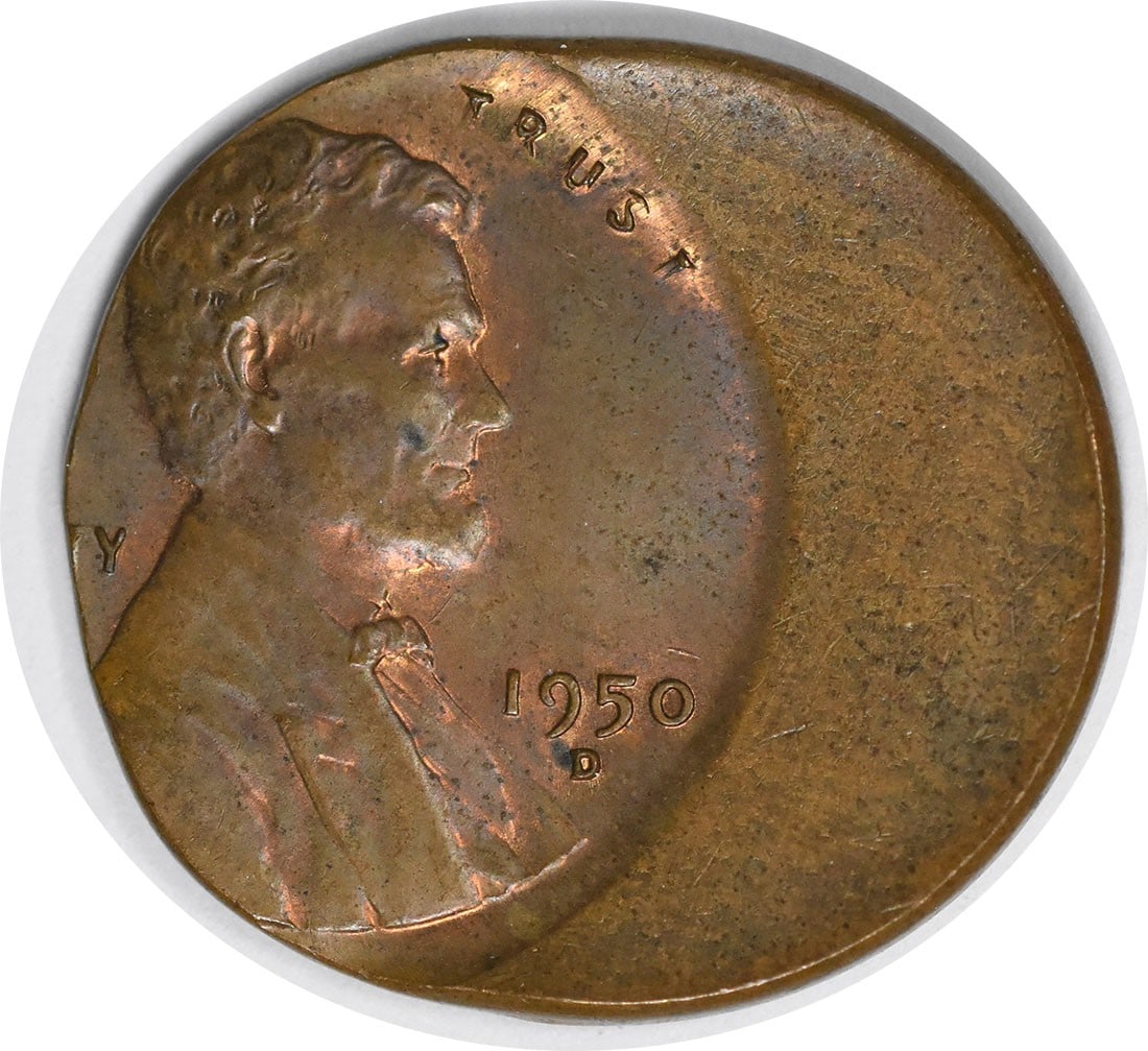 1950-D Lincoln Cent 50 Off Center BU Uncertified Copper Coin: 1950-D Lincoln Cent 50 Off Center BU Uncertified Copper Coin This 1950-D Lincoln Cent features a striking 50% off-center strike, showcasing the unique characteristics of misaligned coins. It is in unc