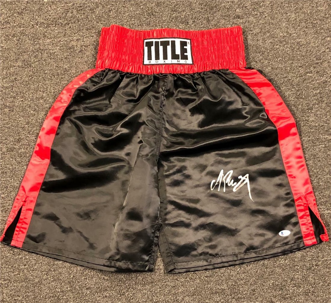Andy Ruiz Jr Signed Boxing Trunks Beckett Authenticated: Andy Ruiz Jr Signed Boxing Trunks Beckett Authenticated Own a piece of boxing history with these original black and red boxing trunks signed by Mexican champion Andy Ruiz Jr. These shorts are an authe