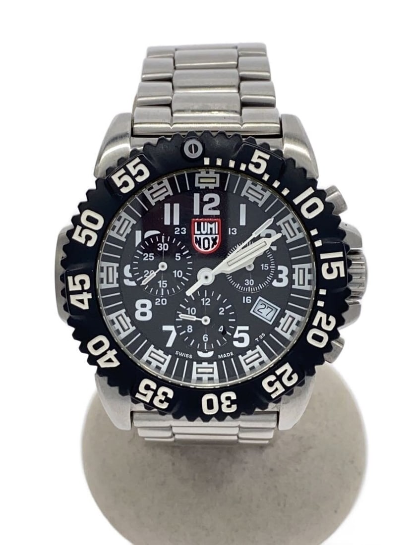LUMINOX Black Dial Stainless Steel Chronograph Men's Wristwatch: LUMINOX Black Dial Stainless Steel Chronograph Men's Wristwatch This LUMINOX men's chronograph wristwatch features a black dial and a durable stainless steel construction. The watch is Swiss-made and 