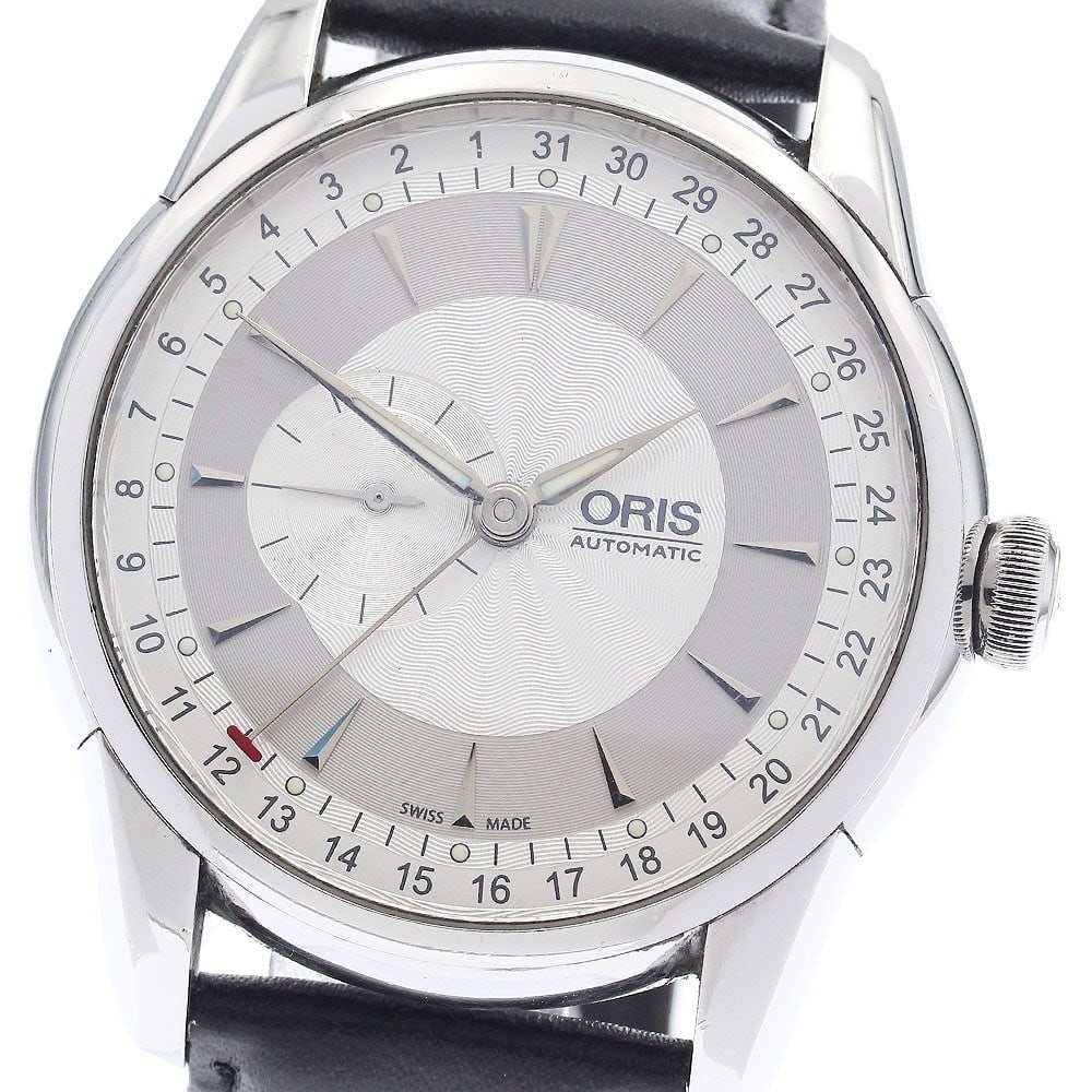 ORIS Artelier 7597 Automatic Date Small Seconds Wristwatch: ORIS Artelier 7597 Automatic Date Small Seconds Wristwatch This ORIS Artelier Pointer Date Small Seconds men's wristwatch features a stainless steel case paired with a silver dial and a leather strap.