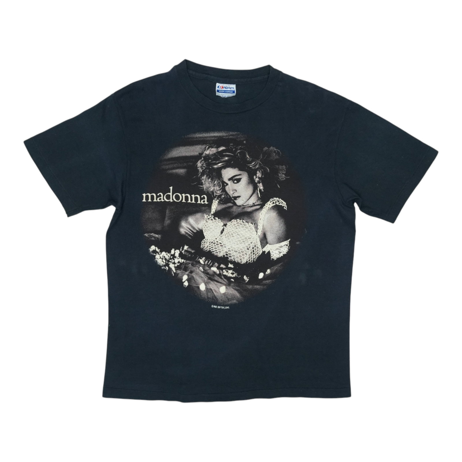 Vintage 1985 Madonna The Virgin Tour Black Cotton Concert T-Shirt Medium: Vintage 1985 Madonna The Virgin Tour Black Cotton Concert T-Shirt Medium This is an original vintage 1985 Madonna The Virgin Tour shirt featuring both front and back graphics. The shirt is made of 100