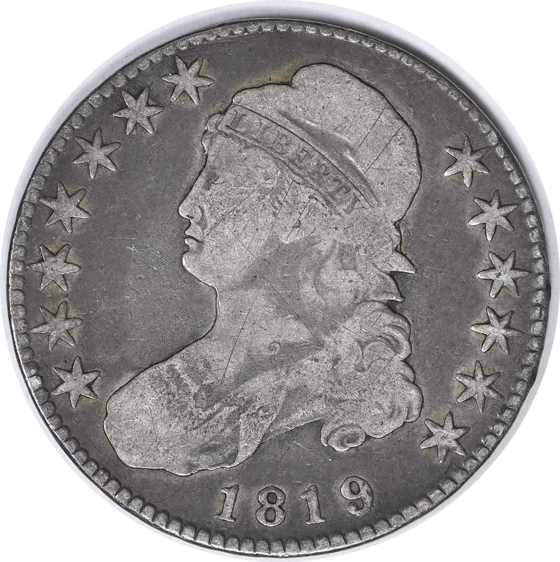 1819 Bust Silver Half Dollar 50C John Reich Design Uncertified: 1819 Bust Silver Half Dollar 50C John Reich Design Uncertified This 1819 Bust Silver Half Dollar, designated as Overton 107, showcases a rich history and craftsmanship from the Philadelphia Mint. The 