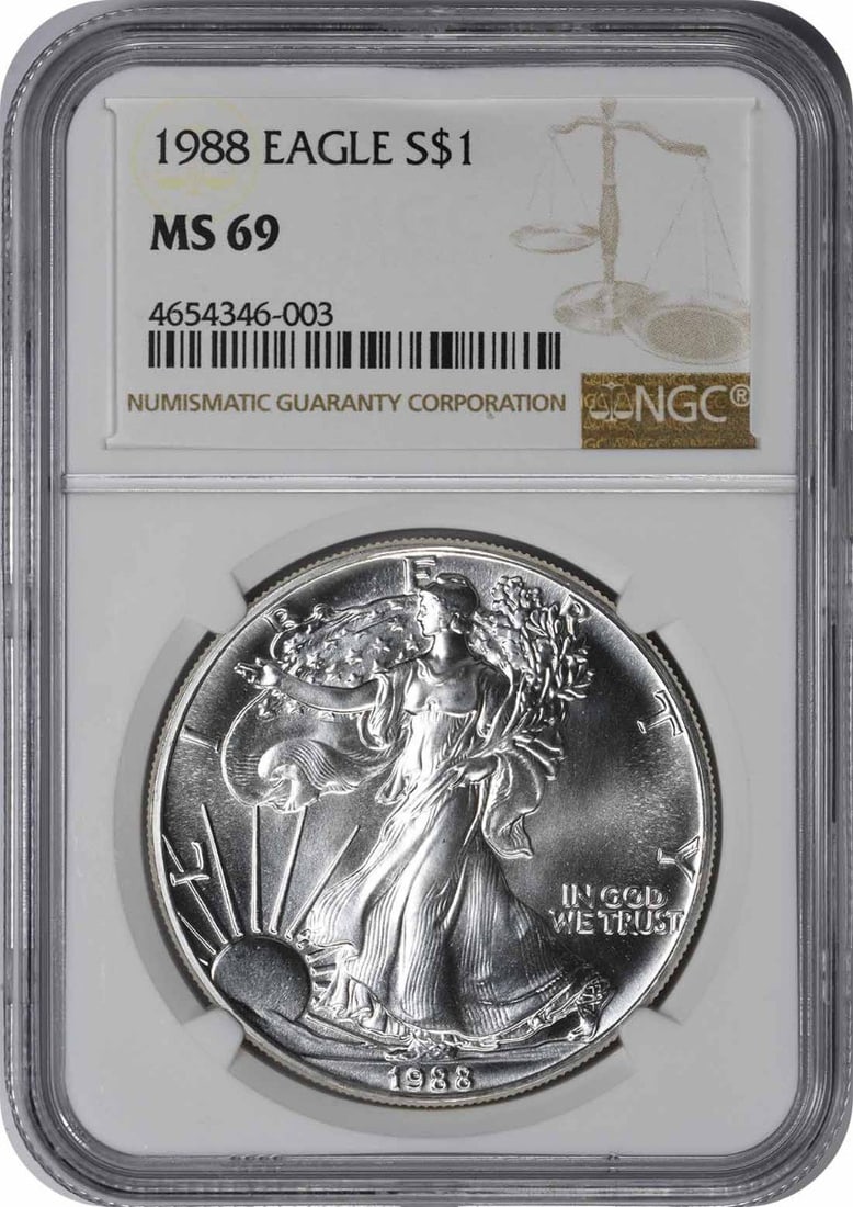 MS69 NGC 1988 Silver American Eagle 1 oz Coin: MS69 NGC 1988 Silver American Eagle 1 oz Coin This 1988 American Silver Eagle Dollar is graded MS69 by NGC and minted by the U.S. Mint. Composed of 1 oz of .999 fine silver, this pre-owned coin is a c