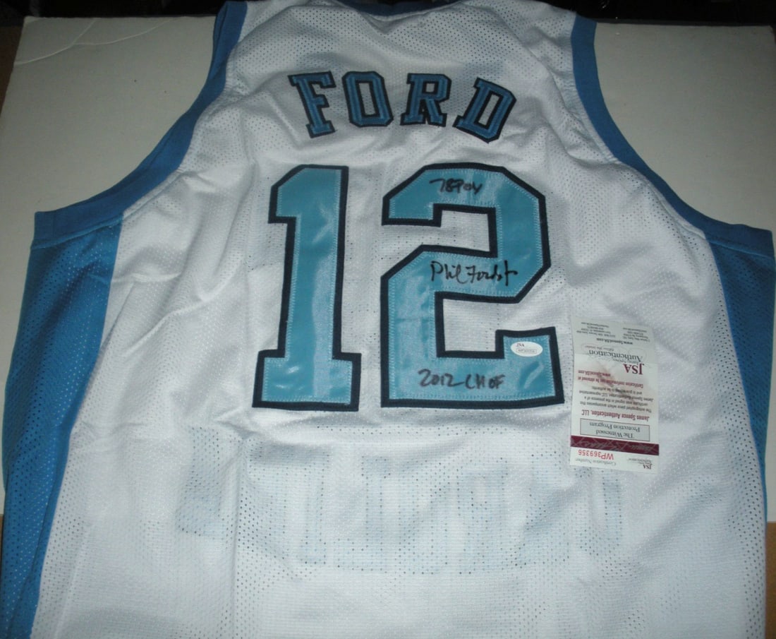 Phil Ford Autographed North Carolina Basketball Jersey PSA Hologram: Phil Ford Autographed North Carolina Basketball Jersey PSA Hologram This is a pre-owned North Carolina Tar Heels basketball jersey signed by Phil Ford. The jersey is an original item and includes refe