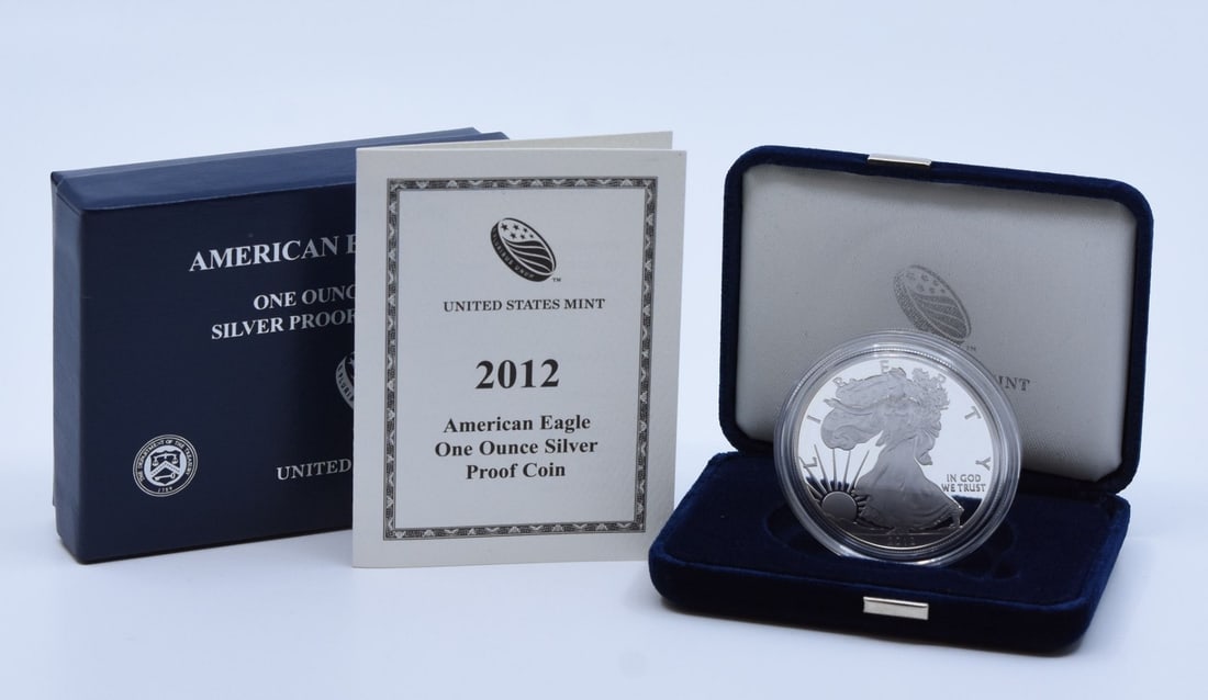 2012 W Proof Silver Eagle Dollar in Government Packaging: 2012 W Proof Silver Eagle Dollar in Government Packaging This 2012-W $1 American Proof Silver Eagle is presented in its original government packaging. Struck at the West Point Mint, this proof coin co