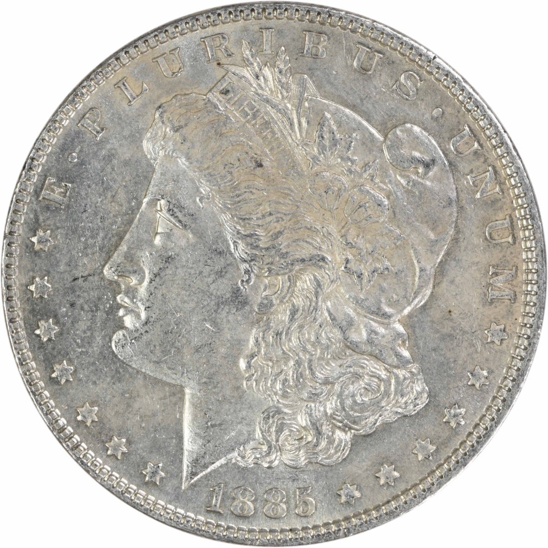 1885 Philadelphia Morgan Dollar AU Uncertified Silver Coin: 1885 Philadelphia Morgan Dollar AU Uncertified Silver Coin This 1885 Morgan Silver Dollar from the Philadelphia Mint is composed of 90% silver and 10% copper. Designed by George T. Morgan, it features