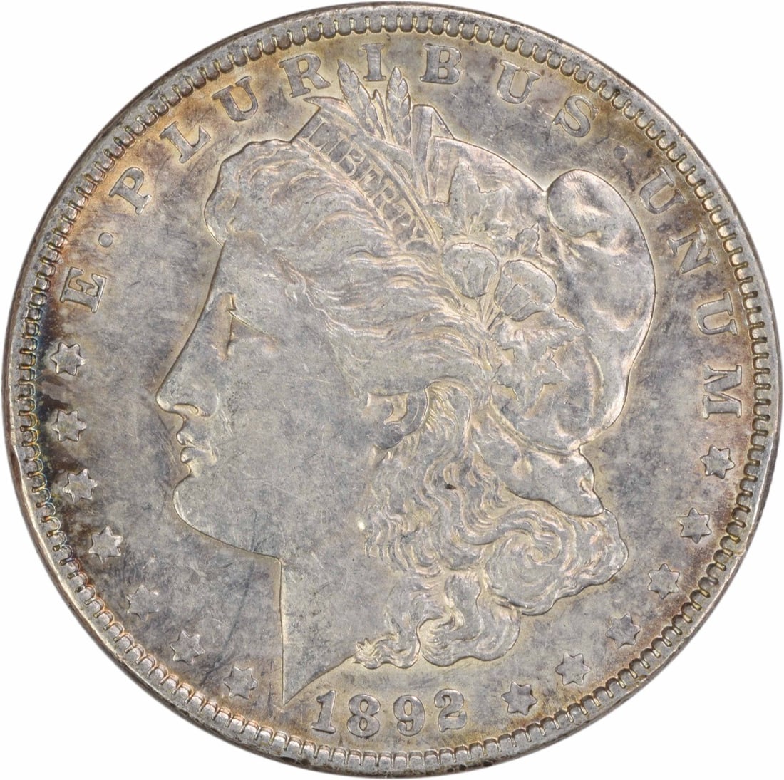 1892 Philadelphia Morgan Dollar 90 Percent Silver EF Grade Uncertified Coin: 1892 Philadelphia Morgan Dollar 90 Percent Silver EF Grade Uncertified Coin This 1892 Morgan Silver Dollar was minted in Philadelphia and designed by George T. Morgan. Composed of 90% silver and 10% c