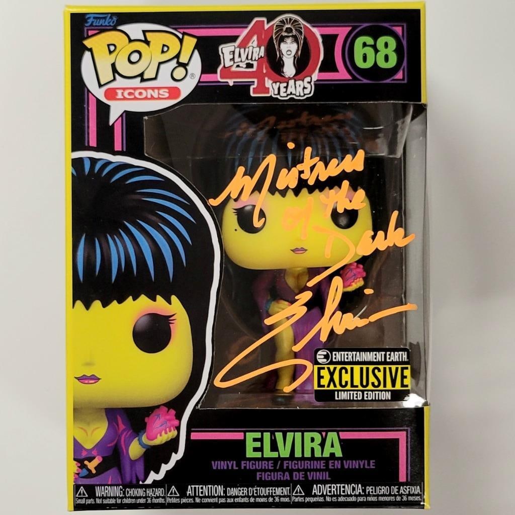 Funko Pop Elvira Mistress of the Dark Signed by Cassandra Peterson Beckett Authenticated: Funko Pop Elvira Mistress of the Dark Signed by Cassandra Peterson Beckett Authenticated This original Funko Pop figure features Elvira from the movie "Mistress of the Dark" and is signed by Cassandra