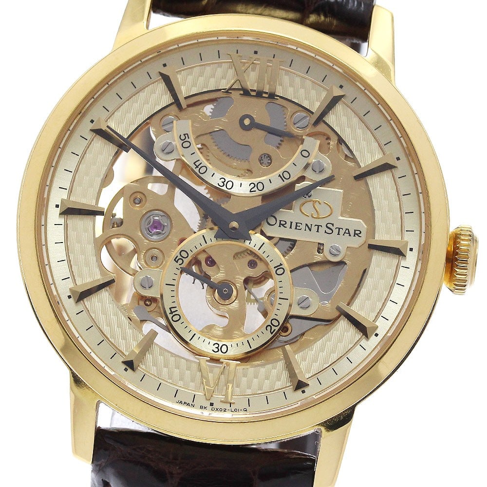 Orient Star Skeleton Manual Wind Power Reserve Wristwatch DX02-A0-B/WZ0031DX: Orient Star Skeleton Manual Wind Power Reserve Wristwatch DX02-A0-B/WZ0031DX This pre-owned ORIENT Star Power Reserve Skeleton men's wristwatch features a manual winding movement and a skeleton dial. 