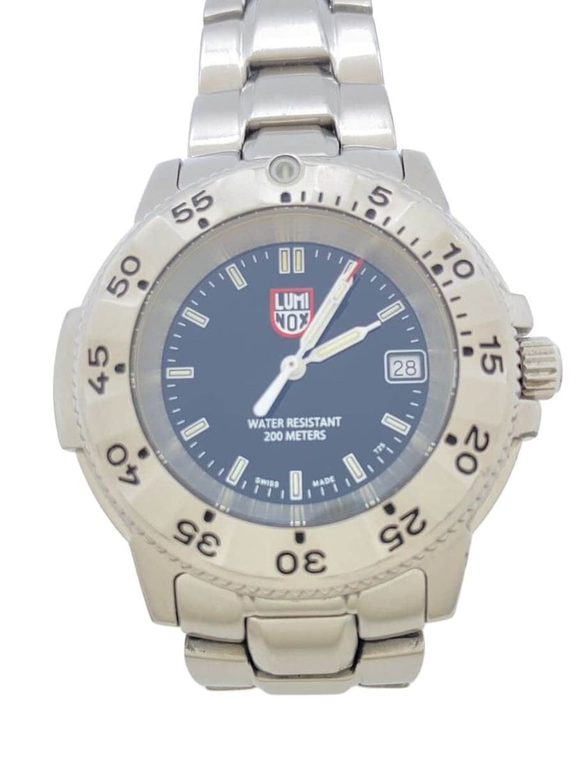 Luminox Navy Seal Quartz Stainless Steel Black Wristwatch: Luminox Navy Seal Quartz Stainless Steel Black Wristwatch This Luminox Navy SEAL Quartz 3202 men's wristwatch features a durable stainless steel case and a black dial. Designed for men, the watch is S
