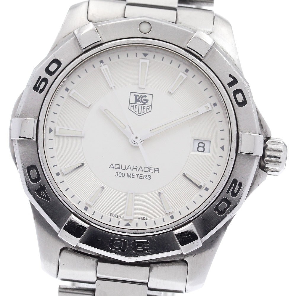 TAG Heuer Aquaracer WAP1111 Quartz Date Stainless Steel Watch: TAG Heuer Aquaracer WAP1111 Quartz Date Stainless Steel Watch This TAG Heuer Aquaracer Date Quartz men's wristwatch features a stainless steel case and bracelet with a silver dial. The watch is powere