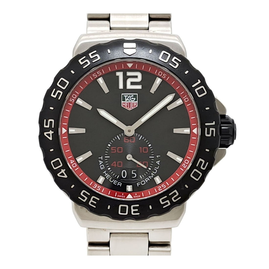 TAG Heuer Quartz Stainless Steel Black Dial Wristwatch WAU1114.BA0858: TAG Heuer Quartz Stainless Steel Black Dial Wristwatch WAU1114.BA0858 This TAG Heuer Formula 1 Grand Date wristwatch is designed for men and features a robust stainless steel case and band. The watch 