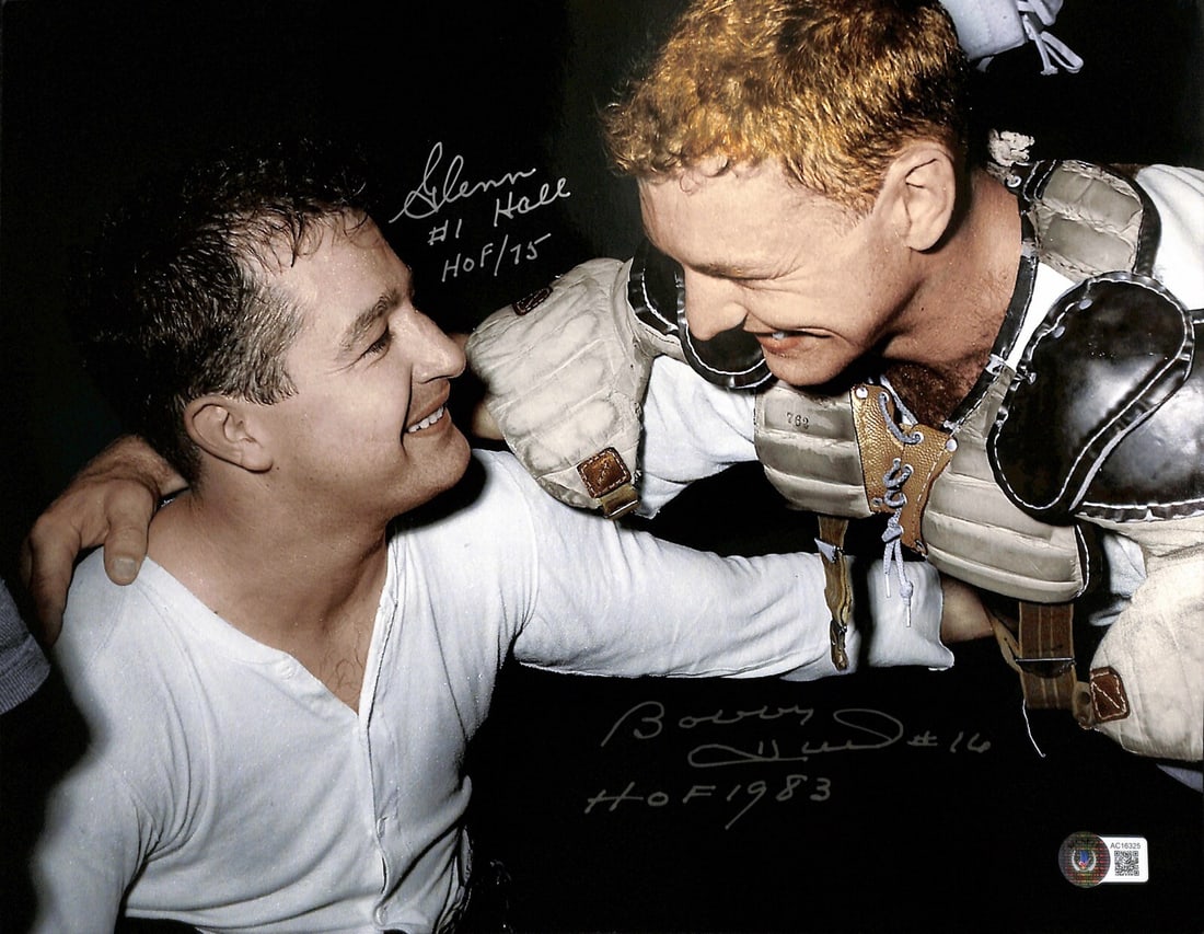 Bobby Hull Glenn Hall Signed 11x14 Photo Beckett Authenticated: Bobby Hull Glenn Hall Signed 11x14 Photo Beckett Authenticated This is an autographed 11x14 photograph featuring Chicago Blackhawks Hall of Famers Bobby Hull and Glenn Hall. Each signature is inscribe