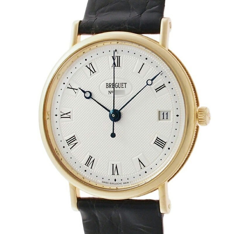 Breguet BA5917 Swiss Automatic Gold Case Wristwatch: Breguet BA5917 Swiss Automatic Gold Case Wristwatch The Breguet Classic BA5917 is a sophisticated unisex wristwatch featuring a silver guilloche dial, striking blue hands, and black Roman numerals. Th