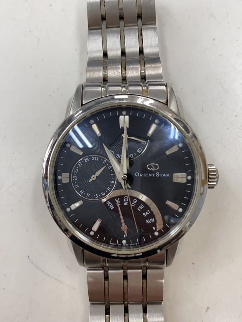 Orient Star Men's Japanese Wristwatch DE00-C0-B: Orient Star Men's Japanese Wristwatch DE00-C0-B This ORIENT STAR DE00-C0-B men's wristwatch is a pre-owned timepiece from Japan. It features a round case with a height and width of 3.7 cm, a dial meas