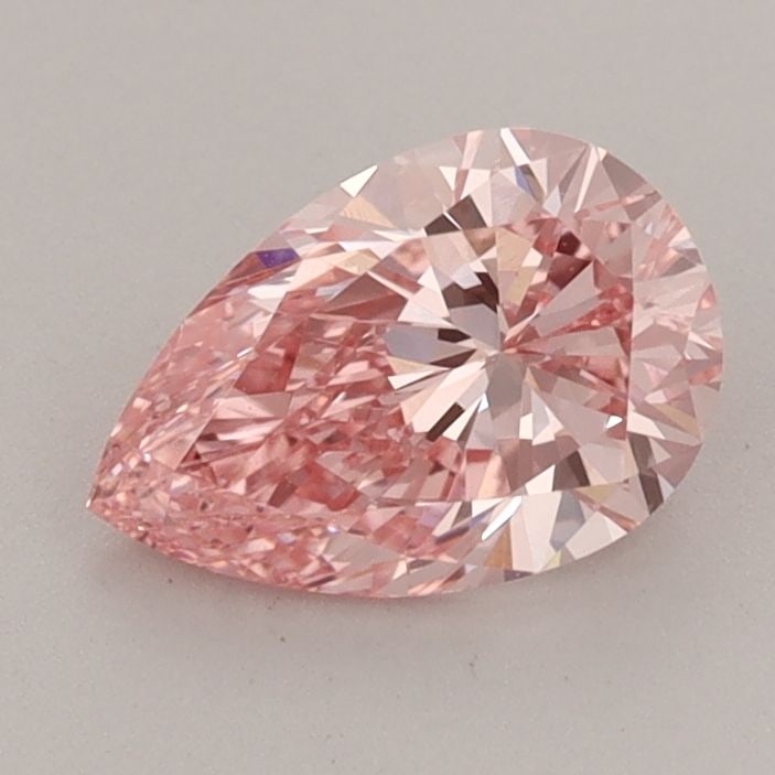 Loose Diamond - PEAR 0.96ct Fancy Vivid Pink VVS2: Loose Diamond - PEAR 0.96ct Fancy Vivid Pink VVS2 Source: This is a real non-mined Diamond that has been grown in a lab Shape: PEAR Carats: 0.96 Color: Fancy Vivid Pink Certification: IGI Video: