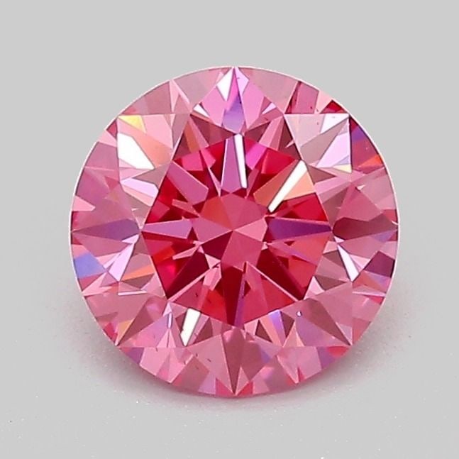 Ideal Loose Diamond - ROUND 1.09ct Fancy Vivid Pink VS2: Ideal Loose Diamond - ROUND 1.09ct Fancy Vivid Pink VS2 Source: This is a real non-mined Diamond that has been grown in a lab Shape: ROUND Carats: 1.09 Color: Fancy Vivid Pink Certification: IGI Video