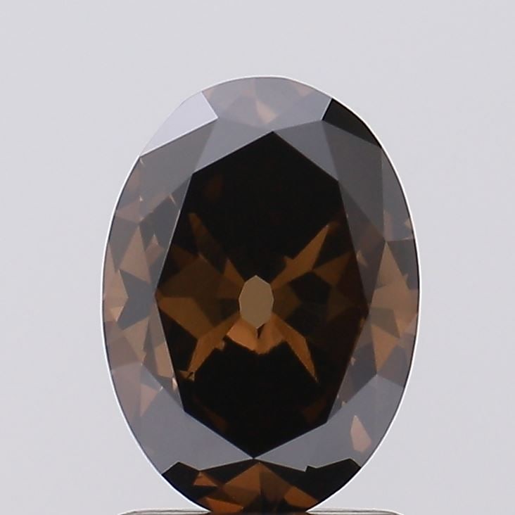 Loose Diamond - OVAL 1.07ct Fancy Deep Brown VS1: Loose Diamond - OVAL 1.07ct Fancy Deep Brown VS1 Source: This is a real non-mined Diamond that has been grown in a lab Shape: OVAL Carats: 1.07 Color: Fancy Deep Brown Certification: IGI Video: