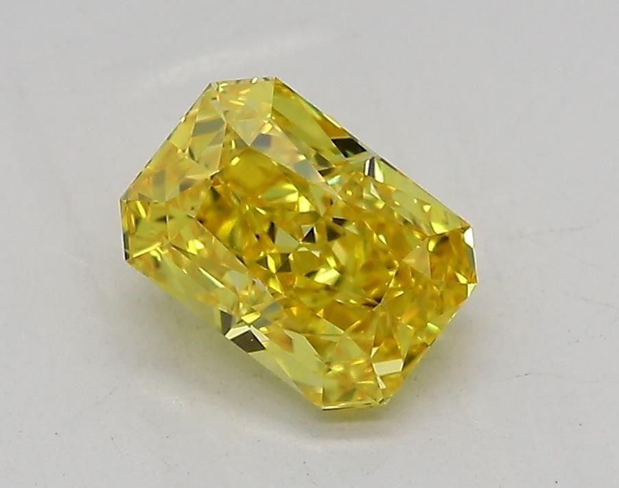 Loose Diamond - RADIANT 1.09ct Fancy Vivid Yellow IF: Loose Diamond - RADIANT 1.09ct Fancy Vivid Yellow IF Source: This is a real non-mined Diamond that has been grown in a lab Shape: RADIANT Carats: 1.09 Color: Fancy Vivid Yellow Certification: IGI Vide