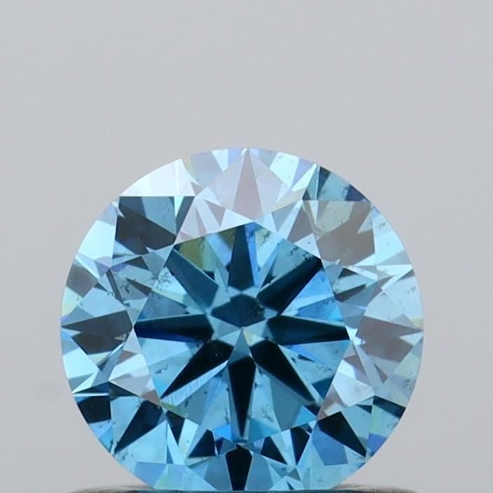Loose Diamond - ROUND 0.61ct Fancy Vivid Blue SI1: Loose Diamond - ROUND 0.61ct Fancy Vivid Blue SI1 Source: This is a real non-mined Diamond that has been grown in a lab Shape: ROUND Carats: 0.61 Color: Fancy Vivid Blue Certification: IGI Video: