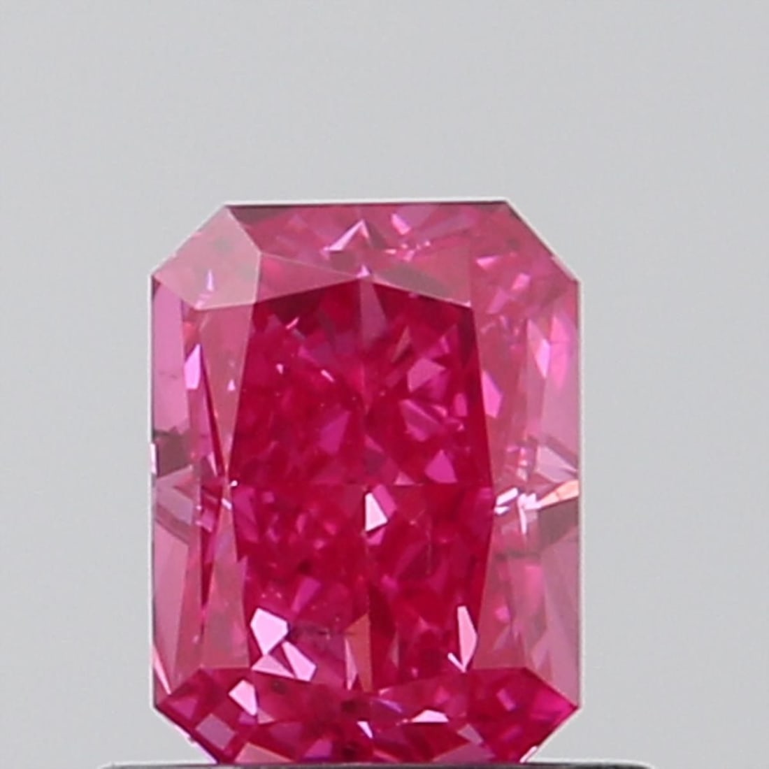 Loose Diamond - RADIANT 0.77ct Fancy Vivid Pink VS2: Loose Diamond - RADIANT 0.77ct Fancy Vivid Pink VS2 Source: This is a real non-mined Diamond that has been grown in a lab Shape: RADIANT Carats: 0.77 Color: Fancy Vivid Pink Certification: NONE Video: