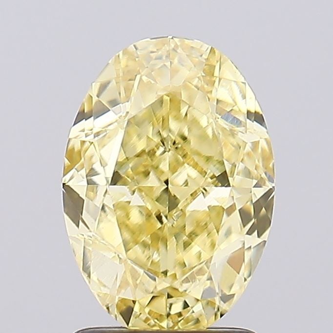 Loose Diamond - OVAL 2.2ct Fancy Yellow VVS2: Loose Diamond - OVAL 2.2ct Fancy Yellow VVS2 Source: This is a real non-mined Diamond that has been grown in a lab Shape: OVAL Carats: 2.2 Color: Fancy Yellow Certification: IGI Video: