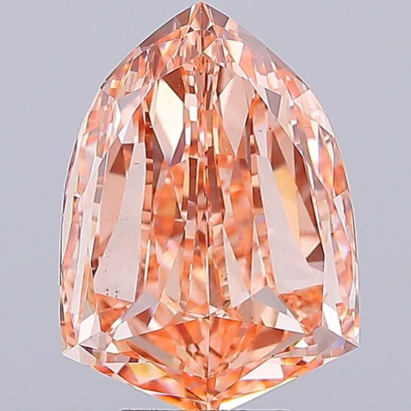 Loose Diamond - SHIELD 5.14ct Fancy Vivid Pink VS1: Loose Diamond - SHIELD 5.14ct Fancy Vivid Pink VS1 Source: This is a real non-mined Diamond that has been grown in a lab Shape: SHIELD Carats: 5.14 Color: Fancy Vivid Pink Certification: IGI Video:
