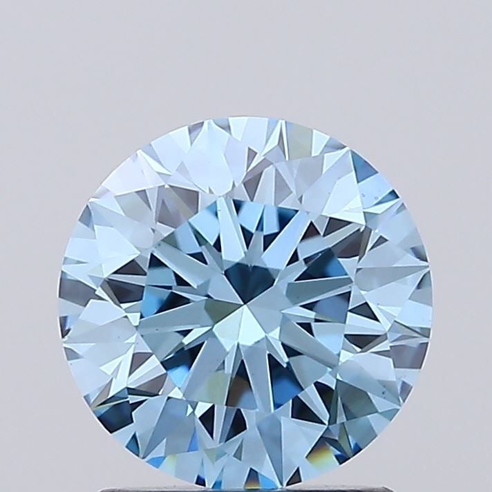 Ideal Loose Diamond - ROUND 1.59ct Fancy Vivid Blue VS1: Ideal Loose Diamond - ROUND 1.59ct Fancy Vivid Blue VS1 Source: This is a real non-mined Diamond that has been grown in a lab Shape: ROUND Carats: 1.59 Color: Fancy Vivid Blue Certification: IGI Video