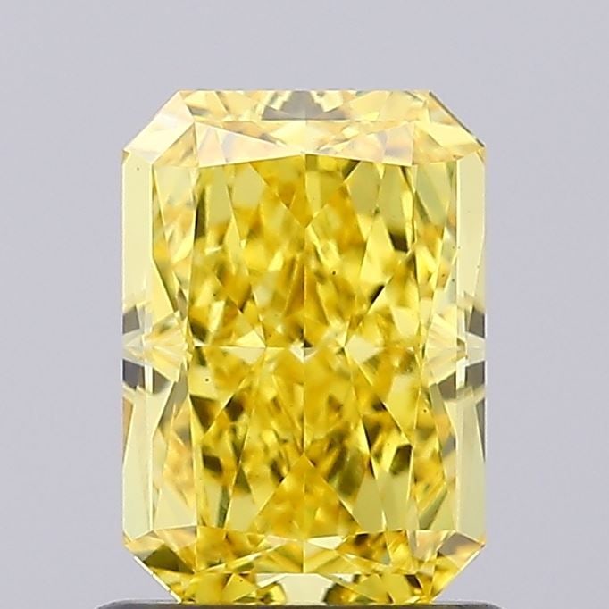 Loose Diamond - RADIANT 1.28ct Fancy Vivid Yellow VS1: Loose Diamond - RADIANT 1.28ct Fancy Vivid Yellow VS1 Source: This is a real non-mined Diamond that has been grown in a lab Shape: RADIANT Carats: 1.28 Color: Fancy Vivid Yellow Certification: IGI Vid