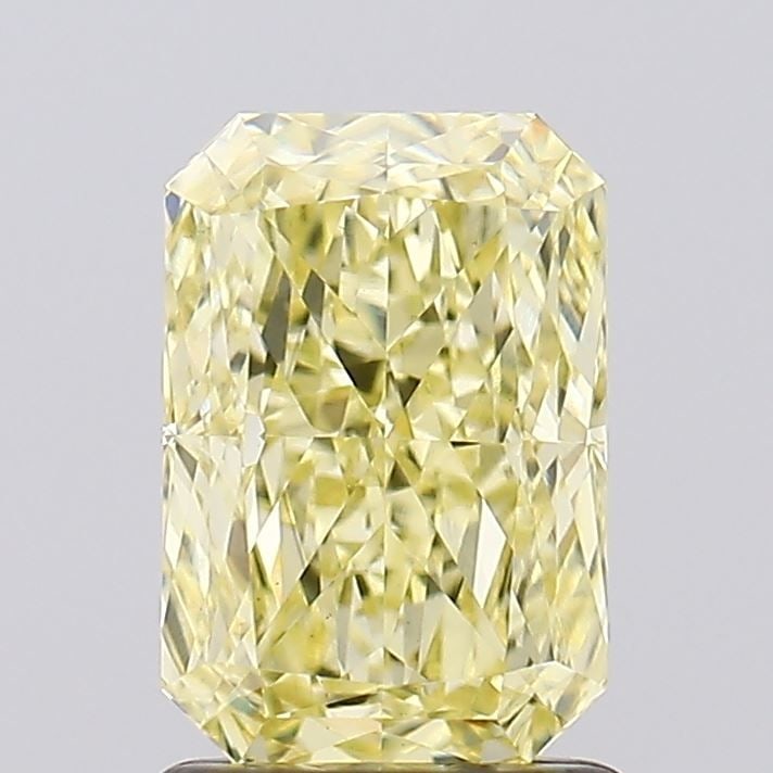 Loose Diamond - RADIANT 1.59ct Fancy Yellow VS1: Loose Diamond - RADIANT 1.59ct Fancy Yellow VS1 Source: This is a real non-mined Diamond that has been grown in a lab Shape: RADIANT Carats: 1.59 Color: Fancy Yellow Certification: IGI Video: