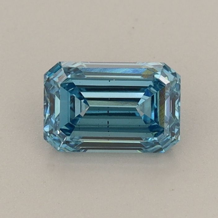 Loose Diamond - EMERALD 0.68ct Fancy Vivid Blue VS2: Loose Diamond - EMERALD 0.68ct Fancy Vivid Blue VS2 Source: This is a real non-mined Diamond that has been grown in a lab Shape: EMERALD Carats: 0.68 Color: Fancy Vivid Blue Certification: IGI Video:
