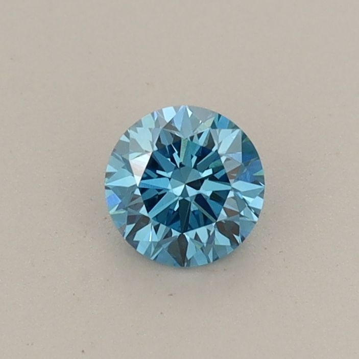 Loose Diamond - ROUND 0.32ct Fancy Vivid Blue VVS2: Loose Diamond - ROUND 0.32ct Fancy Vivid Blue VVS2 Source: This is a real non-mined Diamond that has been grown in a lab Shape: ROUND Carats: 0.32 Color: Fancy Vivid Blue Certification: IGI Video: