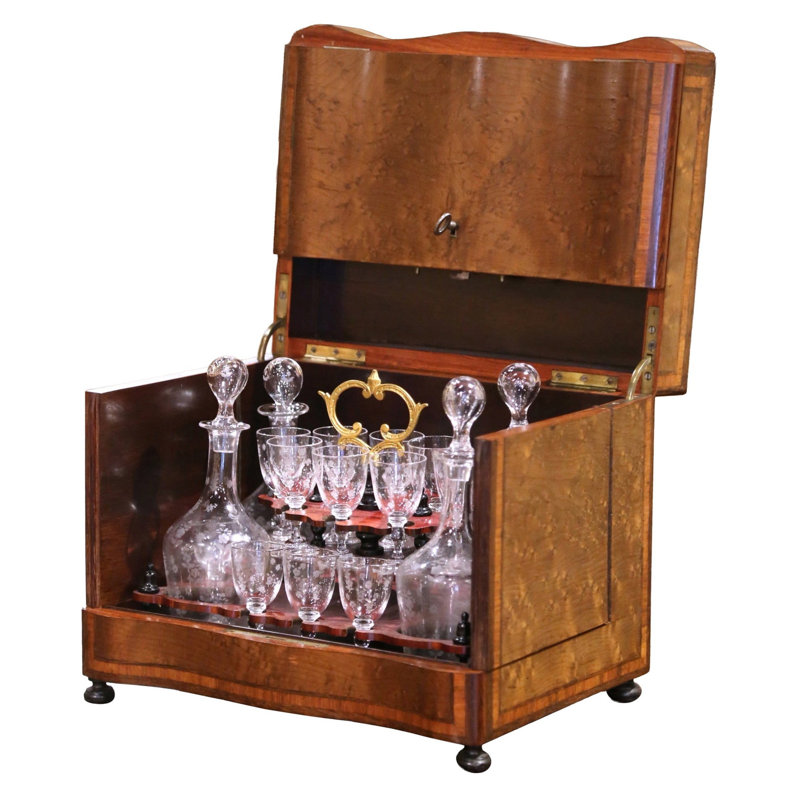 Napoleon III French Burl Walnut Tantalus Set with Four Decanters and Sixteen Cordials: Napoleon III French Burl Walnut Tantalus Set with Four Decanters and Sixteen Cordials This complete 19th-century French Cave a Liqueur is an elegant example of Napoleon III period craftsmanship, made 