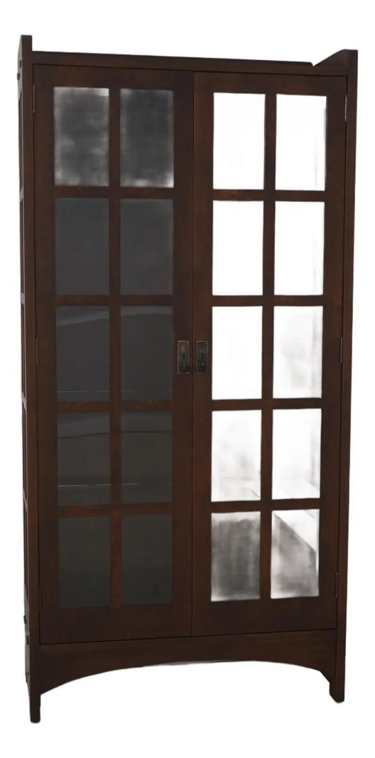 Solid Oak Arts and Crafts Bookcase with Lighted Interior: Solid Oak Arts and Crafts Bookcase with Lighted Interior This Mission Oak Arts & Crafts Stickley bookcase is crafted from solid oak, featuring high-quality construction and a lighted interior. It is f