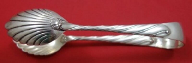 Buccellati Torchon Sterling Silver Ice Tong with Shell Bowls 5 3/4": Buccellati Torchon Sterling Silver Ice Tong with Shell Bowls 5 3/4" Enhance your serveware collection with this exquisite ice tong from Buccellati, crafted in Italy from high-quality sterling silver. 