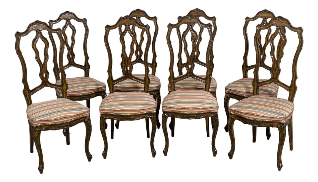 Set of 8 Ornate Carved French Dining Chairs: Set of 8 Ornate Carved French Dining Chairs This exquisite set of 8 French style ornate carved dining room chairs showcases fine craftsmanship and timeless elegance. With approximately 50 years of age
