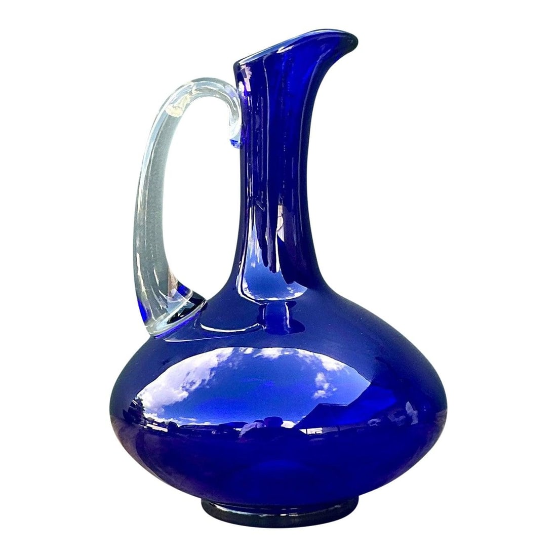 Vintage Signed Cobalt Blue Art Glass Pitcher 10.25 Inch: Vintage Signed Cobalt Blue Art Glass Pitcher 10.25 Inch Make a statement with this exquisite vintage signed art glass pitcher. Hand-blown, it features a deep, luminous cobalt blue hue that captures li