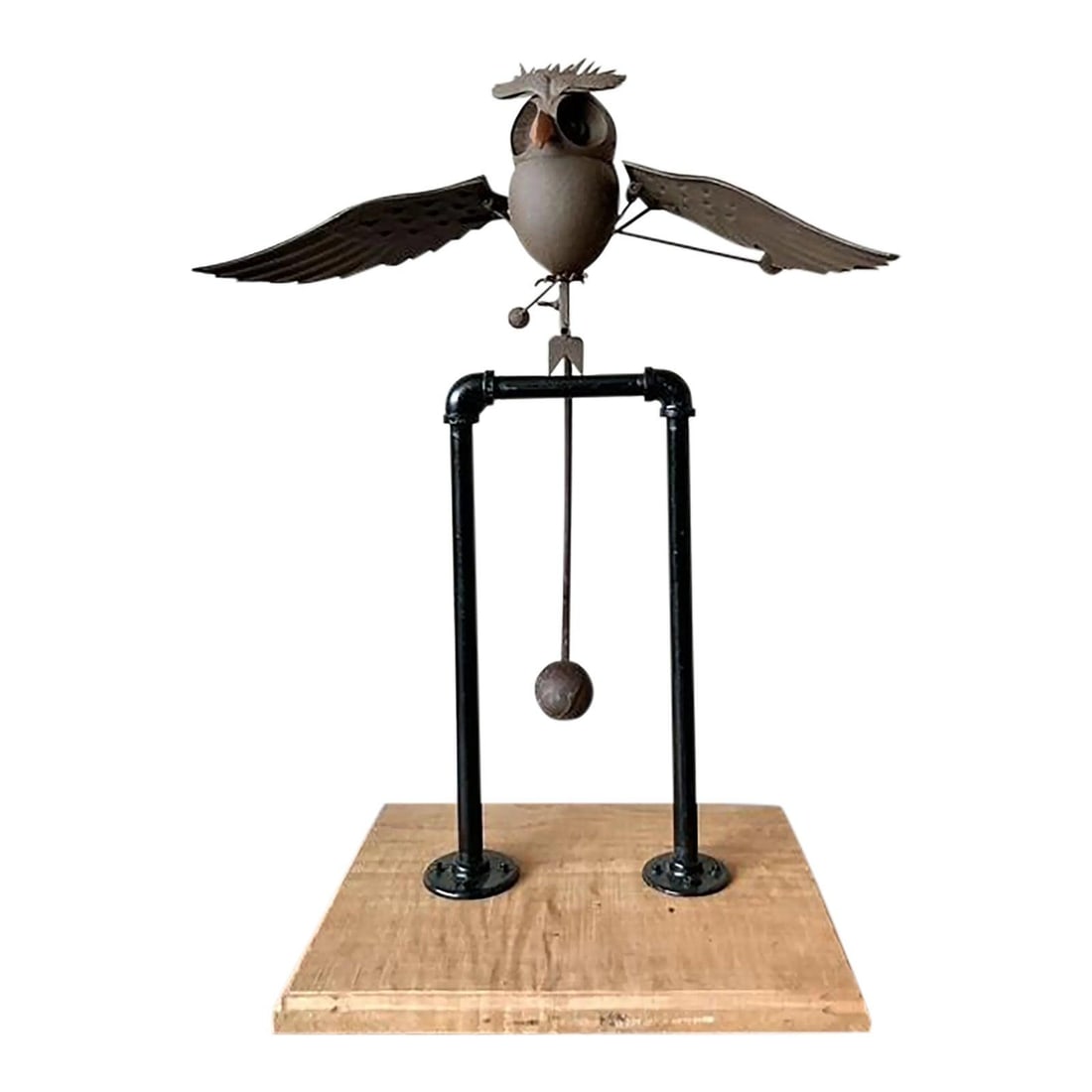 Distressed Metal Owl Folk Art Sculpture With Articulating Wings On Wood Base: Distressed Metal Owl Folk Art Sculpture With Articulating Wings On Wood Base This vintage boho kinetic owl sculpture is a distinctive piece of folk art crafted from distressed metal with kinetic eleme