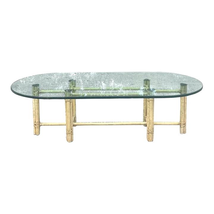 Vintage McGuire Coastal Rattan Coffee Table with Glass Top: Vintage McGuire Coastal Rattan Coffee Table with Glass Top This stunning vintage Coastal coffee table, crafted by the renowned McGuire group, showcases a classic rattan design complemented by a thick 