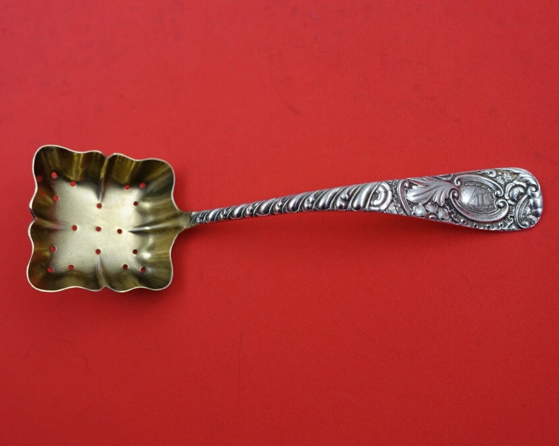 Frank Smith Earle Sterling Silver Sugar Sifter Ladle Gold Washed 6.5": Frank Smith Earle Sterling Silver Sugar Sifter Ladle Gold Washed 6.5" Introducing the Earle Sugar Sifter Ladle by Frank Smith, a perfect addition to your serving collection. This exquisite piece is cr