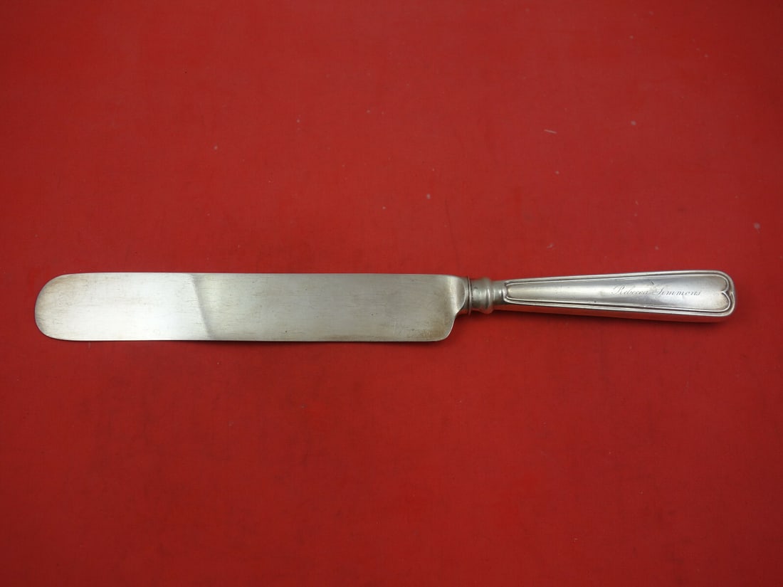 Bailey & Kitchen Fiddle Thread Coin Silver Cake Knife 12": Bailey & Kitchen Fiddle Thread Coin Silver Cake Knife 12" This exquisite Fiddle Thread cake knife from Bailey & Kitchen showcases the elegance of 19th-century craftsmanship. Made of coin silver, this 